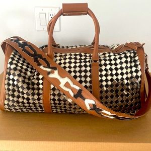 Custom made leather/cow hide duffle bag
